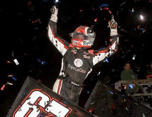 Christopher Bell celebrates on the wing of his Sprint Car after winning Saturday night's World of Outlaws A-Main at Federated Auto Parts Raceway at I-55.  Photo by STLRacingPhotos.com