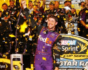 Denny Hamlin celebrates in victory lane after winning last year's NASCAR Sprint Cup Series Sprint All-Star Race at Charlotte Motor Speedway.  Photo by Jerry Markland/Getty Images