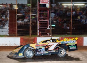Donald McIntosh waves to the crowd as he crosses the finish line to win Saturday night's Spring Nationals Series victory at Dixie Speedway.  Photo by Kevin Prater/praterphoto.com
