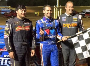 Josh Richards (center) held off Shane Clanton (right) and Brandon Overton (left) to score a hometown win in World of Outlaws Late Model Series action at Tyler County Speedway.  Photo courtesy WoO Media
