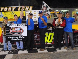 R.A. Brown celebrates with his team after winning his third Late Model Stock feature Friday night at Anderson Motor Speedway.  Photo by Christy Kelley