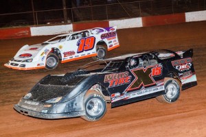 Shaun Chastain (X15) battles with Ronnie Johnson (A19) for the lead in Saturday night's Super Late Model feature at Dixie Speedway.  Chastain would go on to score the victory.  Photo by Kevin Prater/praterphoto.com