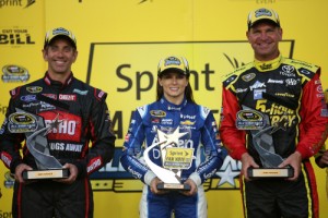 First round winner Greg Biffle, Sprint Fan Vote winner Danica Patrick and second round winner Clint Bowyer pose in Victory lane after the NASCAR Sprint Cup Series Sprint Showdown at Charlotte Motor Speedway Friday night.  Photo by Nick Laham/NASCAR via Getty Images