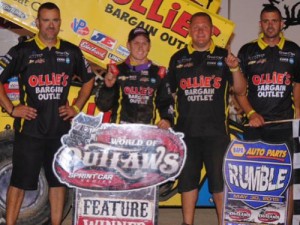 Brad Sweet and his team celebrate in victory lane after winning last week's World of Outlaws Sprint Car Series event at I-96 Speedway.  Photo by T.J. Buffenbarger