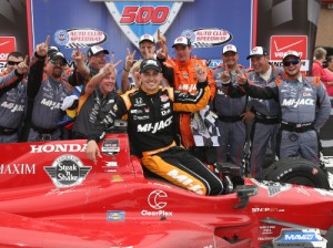 Graham Rahal and his Rahal Letterman Lanigan Racing team celebrate in victory lane after winning Saturday's Verizon IndyCar Series race at Auto Club Speedway.  Photo by Chris Jones