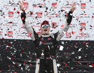 Josef Newgarden celebrates in victory circle after winning Sunday's Honda Indy Toronto.  Photo by Chris Jones