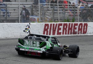 Justin Bonsignore takes a victory lap after scoring his first NASCAR Whelen Modified Tour win of the year Sunday at Riverhead Raceway.  Photo by Will Schneekloth/Getty Images for NASCAR