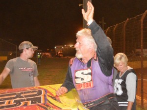 Steve "Hot Rod" LaMance waves to the crowd as he climbs from his race car in victory lane after winning Friday night's FASTRAK Pro Late Model feature at Lavonia Speedway.  Photo by DTGW Productions / CW Photography