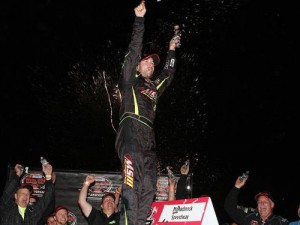 Doug Coby celebrate his third NASCAR Whelen Modified Tour win of the season Saturday night at Monadnock Speedway. Photo by Getty Images for NASCAR