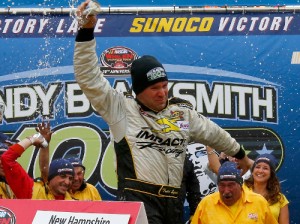 Todd Szegedy celebrates in Victory Lane after winning Saturday's NASCAR Whelen Modified Tour race at New Hampshire Motor Speedway.  Photo by Jonathan Ferrey/NASCAR via Getty Images