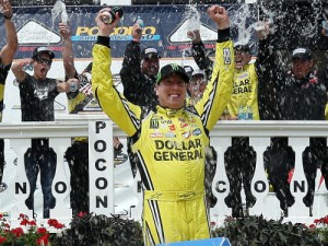 Kyle Busch celebrates in victory lane after winning Saturday's NASCAR Camping World Truck Series race at Pocono Raceway.  Photo by Nick Laham/Getty Images
