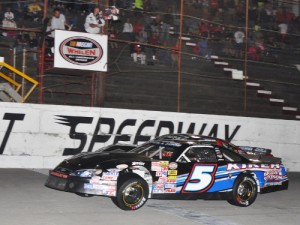 Lee Pulliam (5) beats Kres VanDyke (15) by just a couple of feet for the Late Model Stock Car feature win Friday at Kingsport Speedway.  Photo by Randall Perry