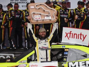 Paul Menard celebrates after taking the win in Saturday's NASCAR Xfinity Series race at Road America.  Photo by Jonathan Moore/NASCAR via Getty Images