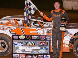 Tim Busha was in the right place at the right time on Saturday night to win the 50-lap Chevrolet Performance Super Late Model feature race at 411 Motor Speedway.  Photo by Scott Miller