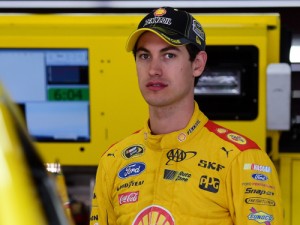 Joey Logano stands in the garage area during practice for Sunday's NASCAR Sprint Cup Series race at New Hampshire Motor Speedway.  Photo by Jared C. Tilton/Getty Images