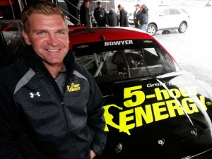 Clint Bowyer poses with his car after announcing his 2016 plans to drive for HScott Motorsports, sponsored by 5 Hour Energy, on Friday at Dover International Speedway.  Photo by Brian Lawdermilk/Getty Images