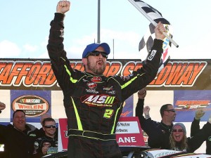 Doug Coby celebrates his sixth NASCAR Whelen Modified Tour win of the season Sunday at Stafford Motor Speedway. Photo by Getty Images for NASCAR