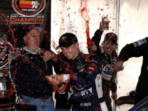 William Byron and his team celebrate winning the 2015 NASCAR K&N Pro Series East championship Saturday at Dover International Speedway. Photo by Getty Images for NASCAR