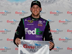 Denny Hamlin poses with the Coors Light Pole Award after qualifying for the pole position for Sunday's NASCAR Sprint Cup Series race at Homestead-Miami Speedway.  Photo by Robert Laberge/NASCAR via Getty Images