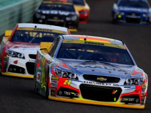 Jeff Gordon leads Kevin Harvick and Martin Truex, Jr. during Sunday's NASCAR Sprint Cup Series race at Homestead-Miami Speedway. Gordon, in his final career start, went on to finish in sixth place. Photo by Chris Trotman/Getty Images