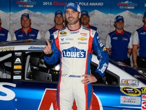Jimmie Johnson poses with the pole award after qualifying for Sunday's NASCAR Sprint Cup Series race at Phoenix International Raceway.  Photo by Robert Laberge/NASCAR via Getty Images