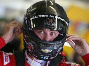 Kevin Harvick adjusts his equipment in the garage area during Friday's practice for the NASCAR Sprint Cup Series race at Texas Motor Speedway. Photo by Sean Gardner/NASCAR via Getty Images