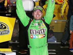 Kyle Busch celebrates winning the series championship and the race in victory lane after Sunday's NASCAR Sprint Cup Series season finale at Homestead-Miami Speedway. Photo by Sean Gardner/NASCAR via Getty Images