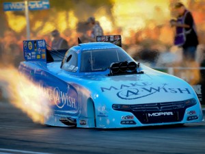 Tommy Johnson, Jr. powered to the top of the Funny Car speed charts in Friday's qualifying for the Auto Club NHRA Finals at Pomona.  Photo courtesy NHRA Media