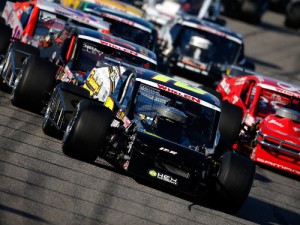 Doug Coby (2) leads the pack in NASCAR Whelen Modified Tour action at New Hampshire Motor Speedway.  Coby scored his third series championship in four years in 2015.  Photo by Getty Images for NASCAR