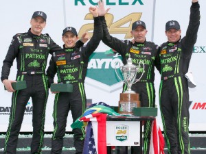 Joannes van Overbeek, Luis Felipe Derani, Ed Brown and Scott Sharp celebrate after taking the overall victory Sunday in the Rolex 24 at Daytona International Speedway.  Photo by Michael L. Levitt LAT Photo USA