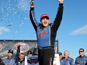 Timmy Solomito celebrates winning the season-opening race for the NASCAR Whelen Modified Tour Sunday at Thompson Speedway Motorsports Park. Photo by Adam Glanzman/NASCAR via Getty Images