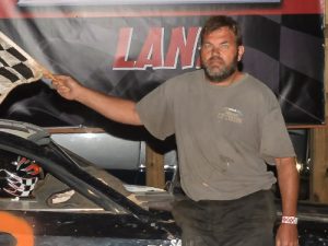 Gary Parker scored an emotional victory Saturday night at Senoia Raceway, winning the Mini-Stock feature after losing his mother earlier in the week.  Photo by Francis Hauke/22fstops.com