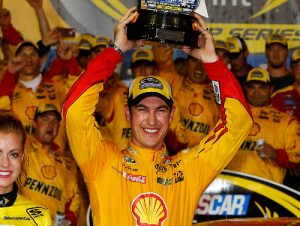 Joey Logano celebrates in victory lane after winning Saturday night's NASCAR Sprint Cup Series Sprint All-Star Race at Charlotte Motor Speedway. Photo by Jonathan Ferrey/NASCAR via Getty Images