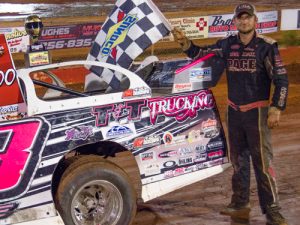 Michael Page celebrates his first career NeSmith Chevrolet Dirt Late Model Series win Saturday night at Talladega Short Track.  Photo by Bruce Carroll/NeSmith Media