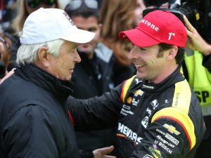 Simon Pagenaud is congratulated by team owner Roger Penske after winning Saturday's Angie's List Grand Prix of Indianapolis on the road course at the Indianapolis Motor Speedway.  Photo by Chris Jones