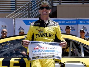 Carl Edwards poses with the Coors Light Pole Award after qualifying for Sunday's NASCAR Sprint Cup Series race at Sonoma Raceway.  Photo by Jared C. Tilton/Getty Images