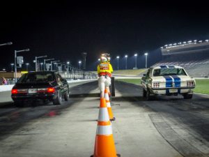 A pair of Ford Mustangs leap from the line during recent Friday Night Drags competition on Atlanta Motor Speedway's pit road drag strip.  Photo: Atlanta Motor Speedway