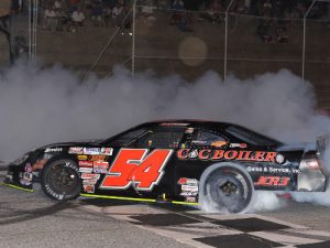 Matt Craig celebrates with a burnout after scoring the win in Saturday night's CARS Racing Tour Super Late Model feature at Greenville-Pickens Speedway. Photo by Kyle Tretow/CARS Tour