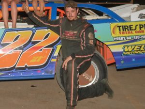Randy Cornwell celebrates in victory lane after winning Saturday night's Hobby Stock feature at Senoia Raceway.  Photo by Francis Hauke/22fstops.com