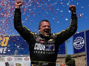 Tony Stewart celebrates in victory lane after winning Sunday's NASCAR Sprint Cup Series race at Sonoma Raceway.  Photo by Chris Trotman/NASCAR via Getty Images