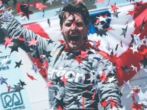 Will Power celebrates in Victory Lane after winning Sunday's Verizon IndyCar Series race at Road America.  Photo by Joe Skibinski