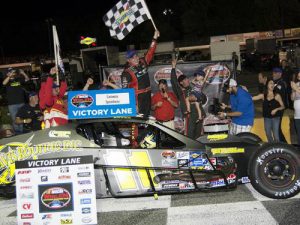 Andy Seuss celebrates after scoring his first NASCAR Whelen Southern Modified Tour win of the season Friday night at Caraway Speedway. Photo by Brenda Meserve/NASCAR