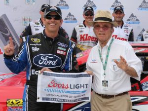 Greg Biffle poses with the Coors Light Pole Award with Jack Roush after qualifying for the pole for Saturday night's NASCAR Sprint Cup Series race at Daytona International Speedway. Photo by Jerry Markland/Getty Images