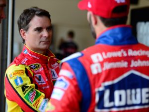 Jeff Gordon (left) talks to teammate Jimmie Johnson (right) during Friday's practice for the NASCAR Sprint Cup Series race at Indianapolis Motor Speedway. Photo by Robert Laberge/Getty Images