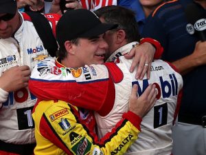 Jeff Gordon (left) hugs Tony Stewart (right) after Sunday's NASCAR Sprint Cup Series race at the Indianapolis Motor Speedway. Photo by Sean Gardner/NASCAR via Getty Images