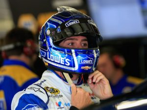 Jimmie Johnson stands in the garage area during Saturday's practice for the NASCAR Sprint Cup Series race at New Hampshire Motor Speedway.  Photo by Chris Trotman/Getty Images