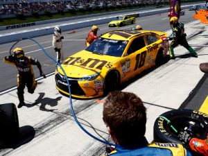 Kyle Busch's M&M's Joe Gibbs Racing crew makes a pit stop in the June NASCAR Sprint Cup Series race at Pocono Raceway.  Photo by Jeff Zelevansky/Getty Images