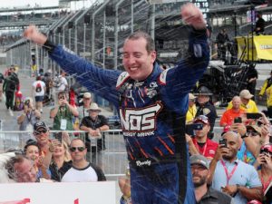 Kyle Busch celebrates in victory lane after winning Saturday's NASCAR Xfinity Series race at Indianapolis Motor Speedway.  Photo by Rey Del Rio/Getty Images