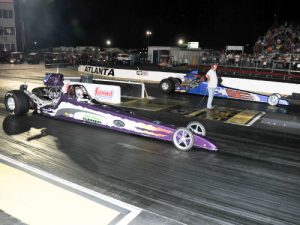 Ray Lacount (far lane) and Jessie Young (near lane) faced off in the Super Pro final at Saturday's Night of Fire at the Atlanta Dragway.  Lacount would go on to score the victory.  Photo by Jerry Towns
