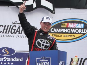 Brett Moffitt celebrates in victory lane after winning Saturday's NASCAR Camping World Truck Series race at Michigan International Speedway.  Photo by Rey Del Rio/Getty Images